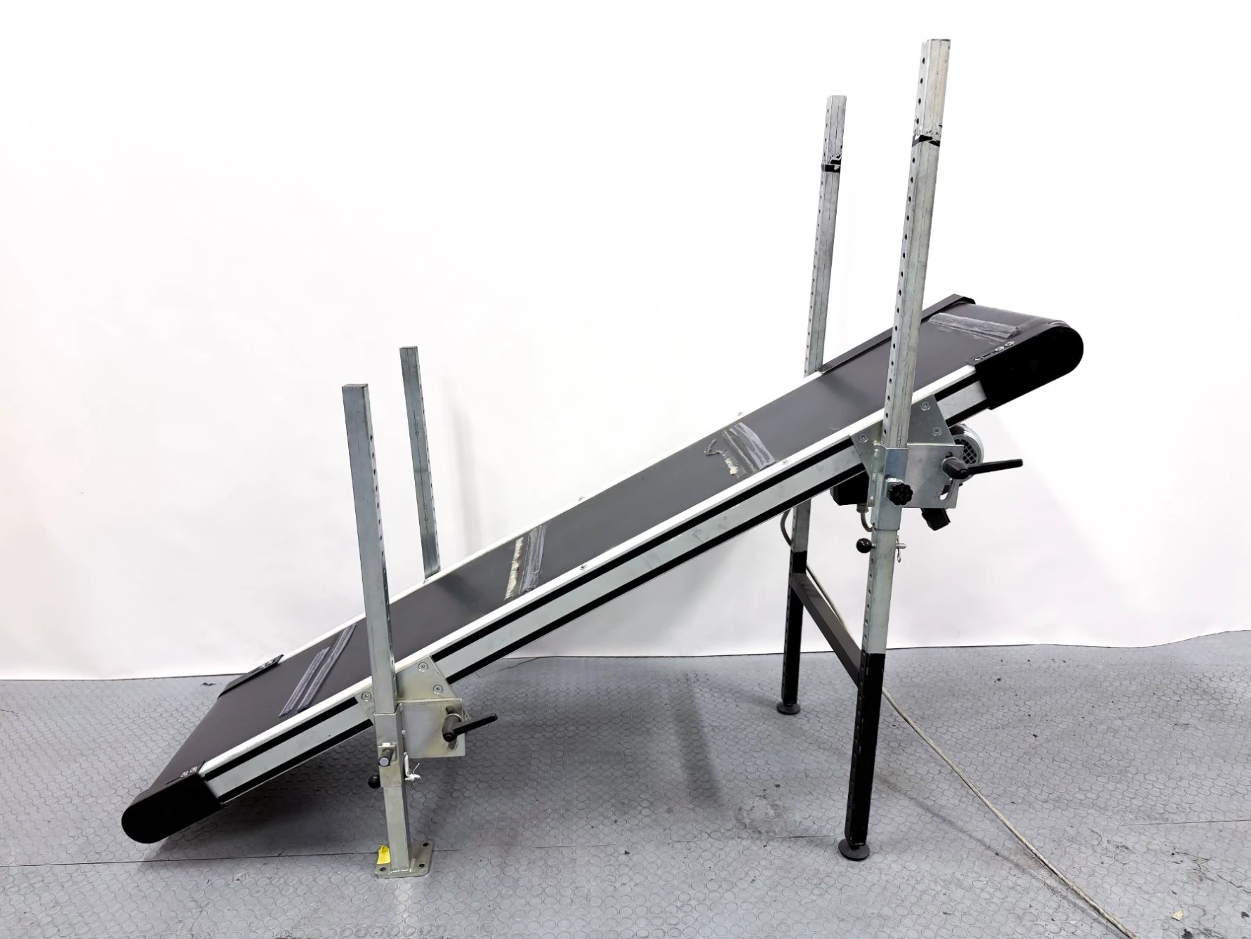 ompack-stigande-bandtransportör-1